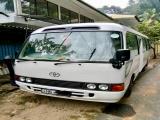 Toyota Coaster HZB50R Bus For Rent.